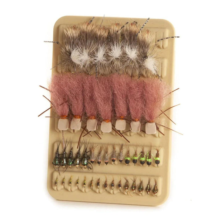 Fishpond 3x5 Tacky Mat holding flies