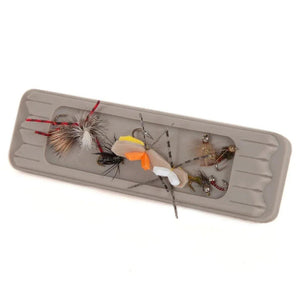Fishpond Tacky Fly Dock MagPad holding flies