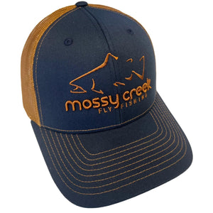 Mossy Creek Fly Fishing logo trucker hat with navy front, caramel mesh and orange trout logo, front angle view