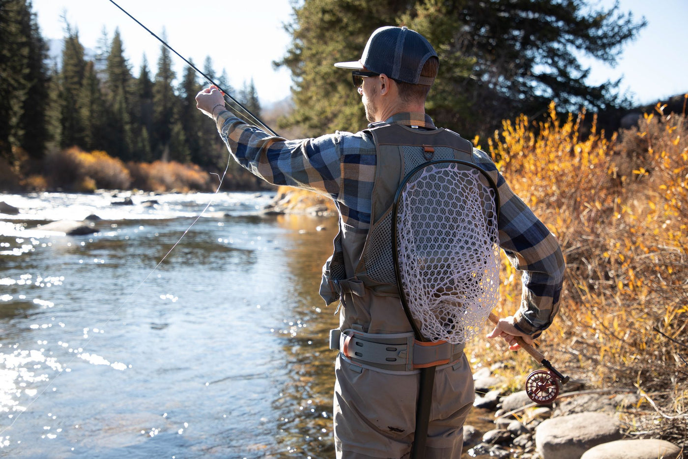 How to Attach a Trout Net to a Fly Fishing Vest
