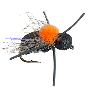 Umpqua Fathead Beetle fly with peacock body and orange post